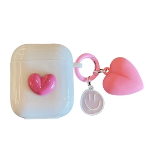 White silicone heart case for AirPods Pro with cute pink charms and smiling face pendant