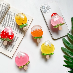 Cute fruit and ice cream phone grip stands made of colorful resin for secure grip