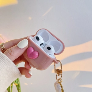 Pink silicone case for AirPods with 3D heart design and elegant gold metallic keychain
