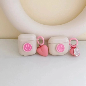 Cute cream AirPods Pro case with pink 3D smiley face and heart pendant accessory