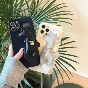 Custodie lusso con cinturino giraffa per iPhone 16 nere e crema con tracolla