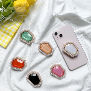 Collapsible gem phone socket stand with pearls and rhinestones in six vibrant colors