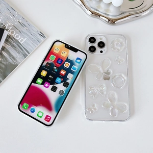 Detail of transparent iPhone case featuring 3D laser butterflies and floral ornaments