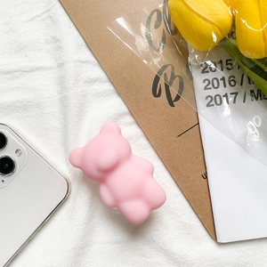 Pink bear collapsible grip for phones, cute 3D animal design on a white surface