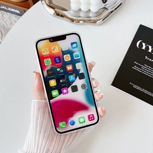 Clear iPhone case held in hand showing full coverage design and transparent finish