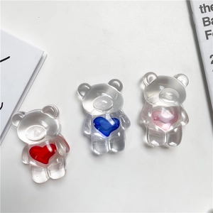 Three clear acrylic bear phone sockets with red, blue, and pink heart centers