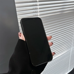 Detail of silver foil bear phone case with realistic light and shadow on iPhone