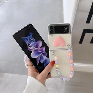 Foldable cream case for Samsung Z Flip with 3D pink heart and colorful beaded hand strap