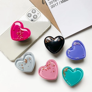 Quicksand heart-shaped phone grip tok with crystal bead decoration in multiple colors