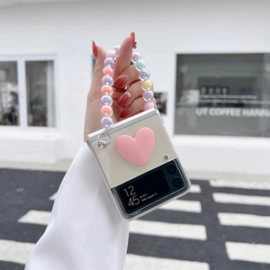 Clear folding phone case for Galaxy Z Flip with pink 3D heart and colorful bead strap