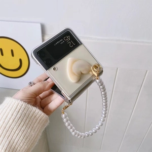Clear folding case with 3D heart decor and pearl chain strap for Galaxy Z Flip series