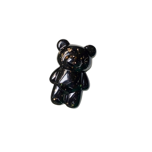 Creative black translucent bear phone grip with gold foil inlay on a white background