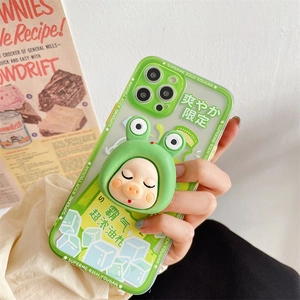 Detail of cute 3D cartoon frog pop socket on a green oil citrus themed iPhone case