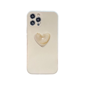 Close-up of beige liquid silicone iPhone case with a marble texture 3D heart stand