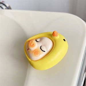 Detailed close-up of a 3D cute pig wearing a yellow duck suit phone socket stand