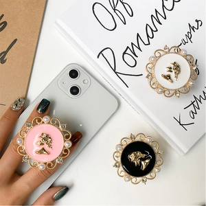 Retro relief phone grip with gold cameo design, pearls, and crystals in three elegant colors