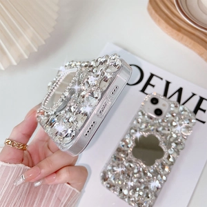 Macro detail of luxury rhinestone mirror phone case with premium glittering diamonds