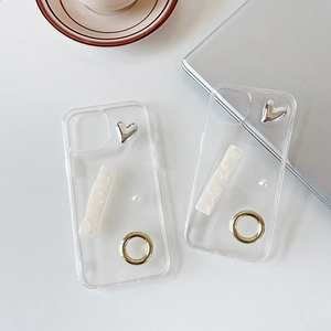 Detail of iPhone case featuring silver hearts, marble pattern, and golden ring holder
