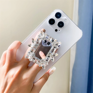 Close-up of luxury rectangular mirror phone socket with rhinestone crystals in silver