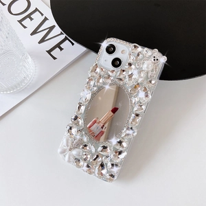 Luxury iPhone case with rhinestones, pearls, 3D bear detail, and built-in makeup mirror