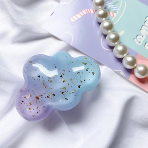 Cloud-shaped phone grip with purple blue gradient resin and embedded gold leaf sequins