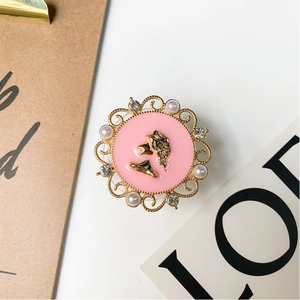 Golden vintage cameo phone socket with pink enamel and pearl rhinestone accents