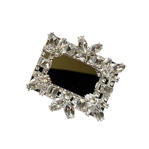 Luxury rectangular phone socket with crystal rhinestones on a black mirrored surface