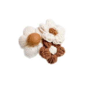 Handmade crochet flower phone socket grip in coffee and cream plush yarn design