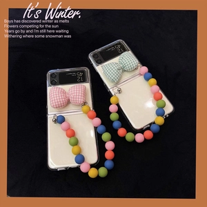 Transparent Z Flip phone case with checkered ribbon bow and colorful beaded wrist strap