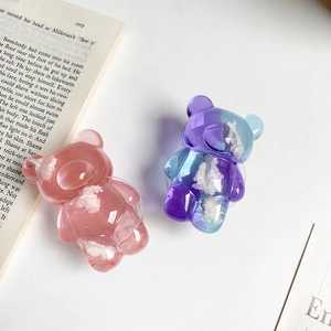 Close-up of pink cloud bear phone grip with a 3D resin texture and glossy finish