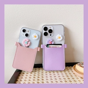 Detail of crossbody phone cases with floral leather card holder and daisy flower appliques