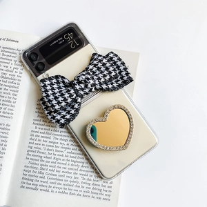 Samsung Z Flip case with houndstooth bow and heart-shaped rhinestone vanity mirror stand