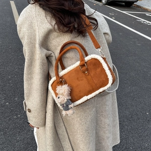 Retro caramel brown suede handbag with white faux fur trim and cute bear charm pendant