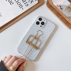 Detail of glitter purple iPhone case featuring a functional large gold binder clip stand