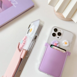 Close-up of pastoral style leather card wallet with resin daisies for iPhone case