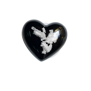 Minimalist black heart phone socket with white crushed stone texture and glossy finish