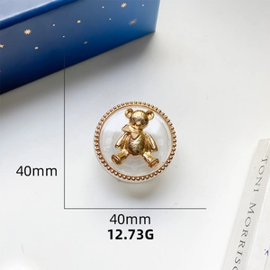 Detailed view of a golden bear phone socket holder with dimensions 40mm and 12.73g weight