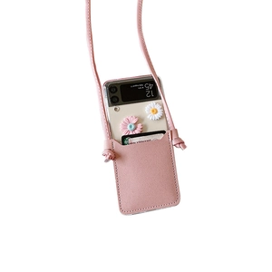 Pink crossbody phone pouch for Samsung Z Flip 6 featuring a daisy patterned leather case