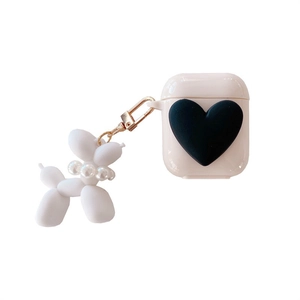 Minimalist beige AirPods case with black heart and white balloon dog keychain