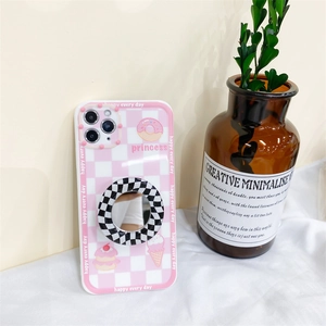 Detail of pink checkerboard phone case with sweet dessert patterns and a mirror grip stand