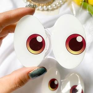 Detail of creative cartoon big eyes phone grip with high gloss finish and gradient iris