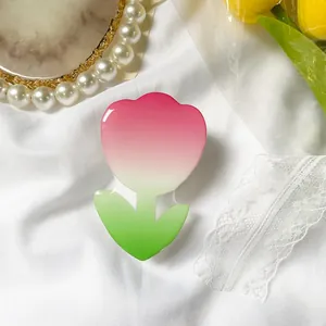 Close-up of tulip flower phone grip with pink to green gradient on silk fabric