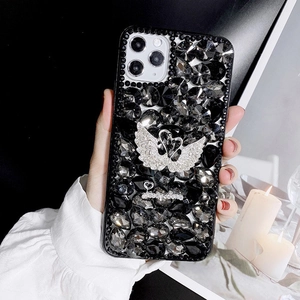 Coque iPhone de luxe avec strass anthracite étincelants et emblème de cygne en argent