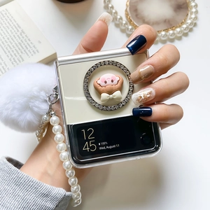 Detail of Z Flip case with pearl wrist strap, rhinestone stand and pink bow decoration