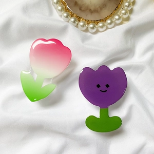 Floral tulip phone socket stand with pink gradient and purple smiley face tulip design
