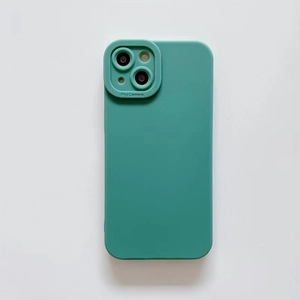 Detail showing deep teal silicone phone case with raised Pro Camera lens protection frame