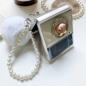 Transparent Galaxy Z Flip case with pearl strap, fur ball charm and Apeach design