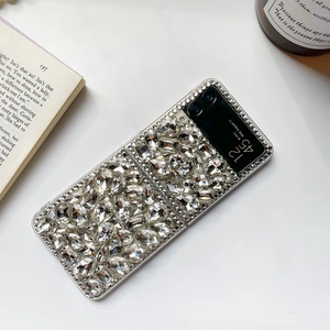 Detail view of luxury Samsung Galaxy Z Flip case with sparkling pear-cut rhinestones