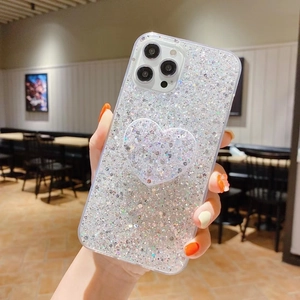 Funda brillante para iPhone con lentejuelas plateadas y soporte plegable de corazón