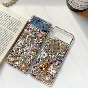 Detailed view of handcrafted Samsung Z Flip case with rhinestones, pearls and bear charms